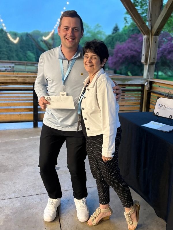 East Park London Prize Winner presented to Angie Wilson by host, Justin Tiseo.